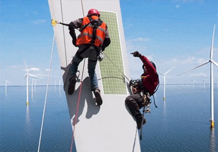 Image of a employees working on wind turbines