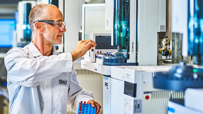 Image of lab technician working in a lab